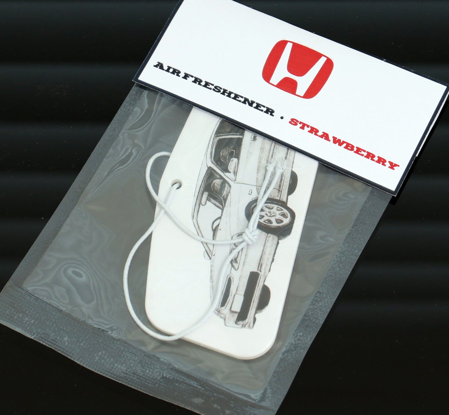 Honda EK Civis air freshener card Strawberry: A sweet and fruity aroma to uplift your spirits.