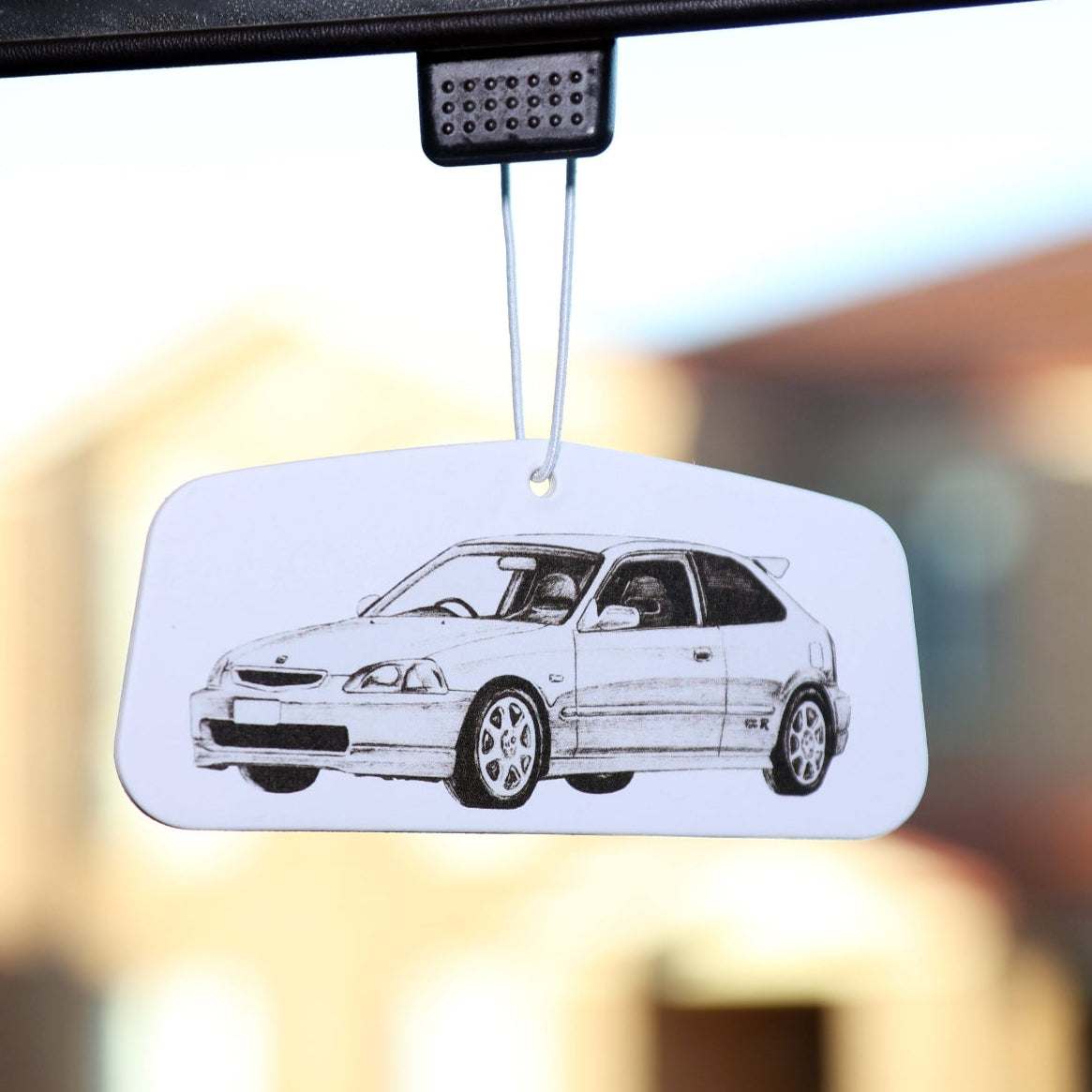 This premium Honda EK Civis air freshener card brings a refreshing fragrance while showcasing the iconic EK Civic in a sleek, artistic design.