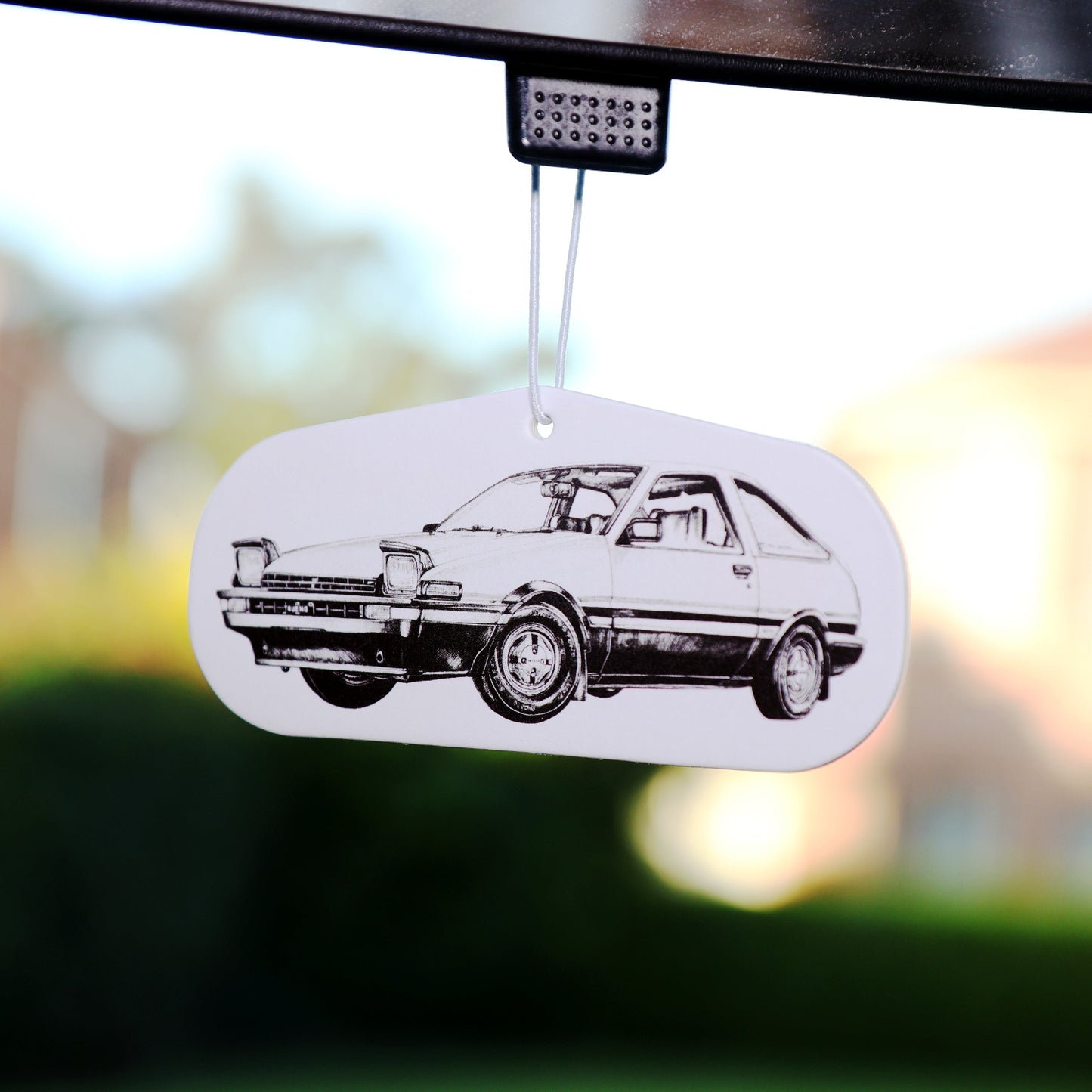 This Initial D AE86 air freshener card black ice scent is ideal for decorating your car and keep the air fresh.