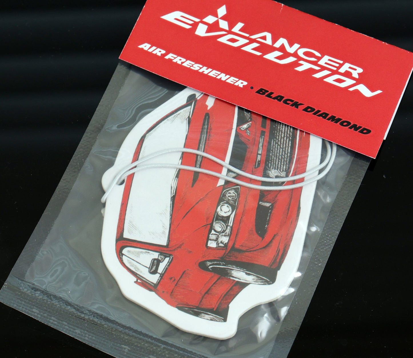 This Lancer Evo VIII air freshener Black Ice scent, a cool, crisp fragrance that keeps your car smelling fresh.