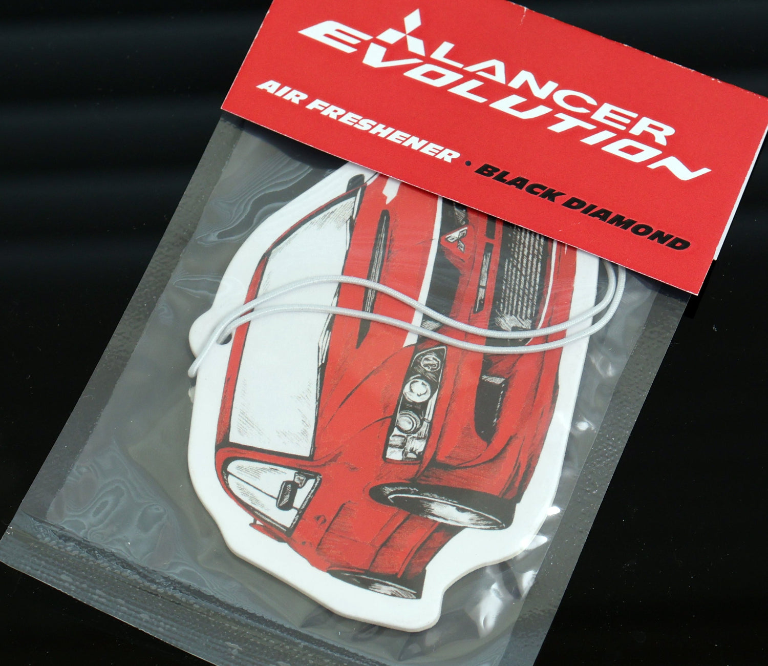 This Lancer Evo VIII air freshener Black Ice scent, a cool, crisp fragrance that keeps your car smelling fresh.