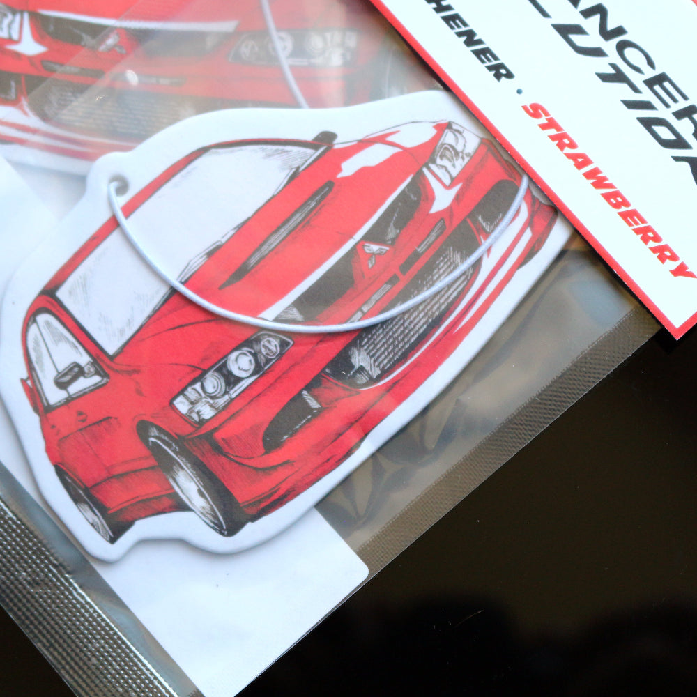 This Lancer Evo VIII air freshener Strawberry scent, a sweet and fruity aroma to uplift your spirits.