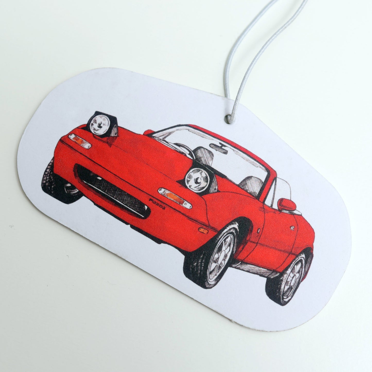 Mazda Miata MX5 Air Freshener closeup.