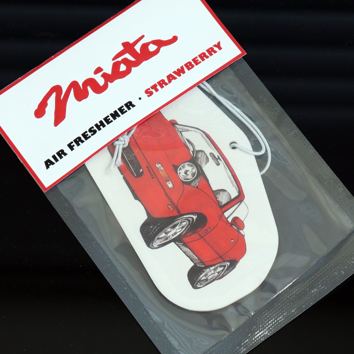 Mazda Miata MX5 Air Freshener Strawberry: A sweet and fruity aroma to uplift your spirits.