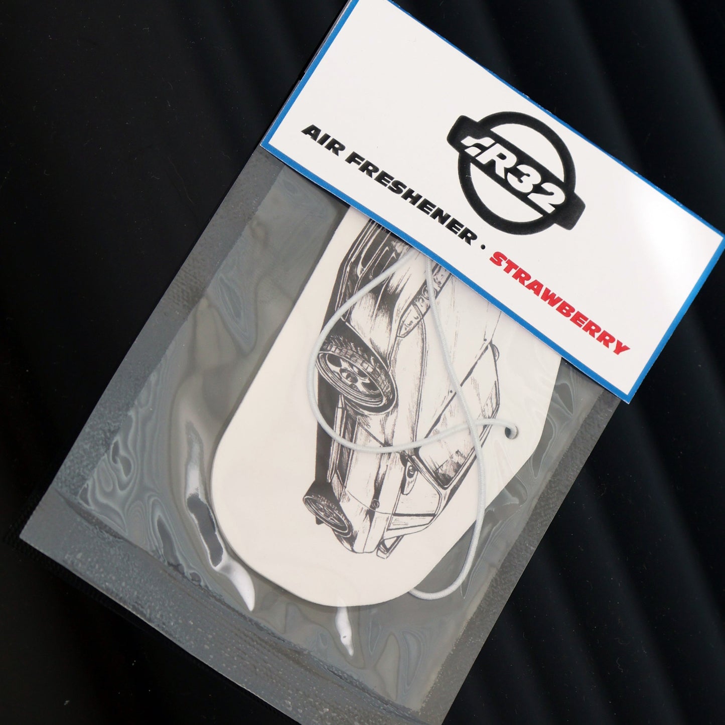 Nissan R32 GT-R Air Freshener Strawberry: A sweet and fruity aroma to uplift your spirits.
