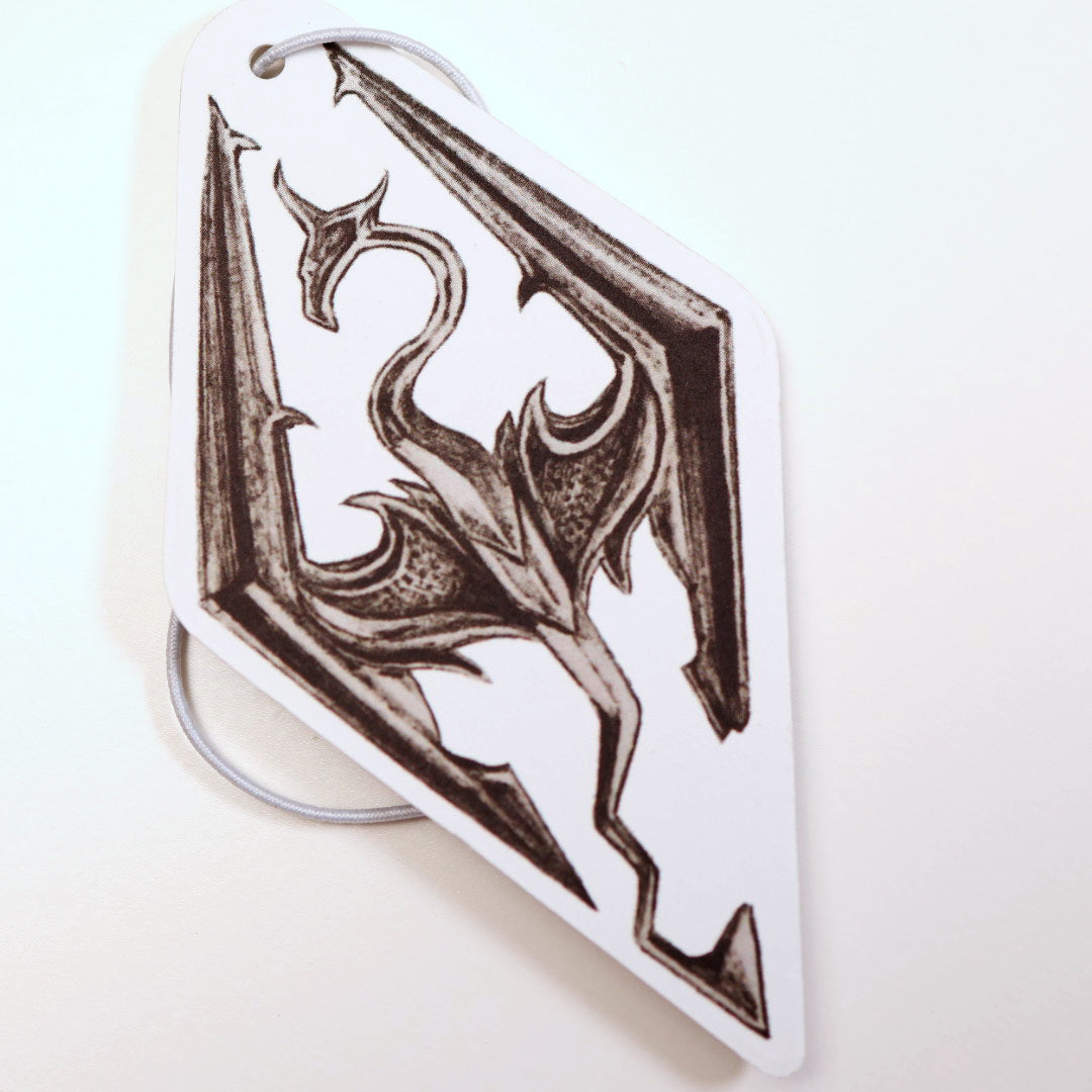 Close up of the Seal of Akatosh car air freshener card design inspired by Skyrim. Measures: H: 10cm x W: 5.5cm.