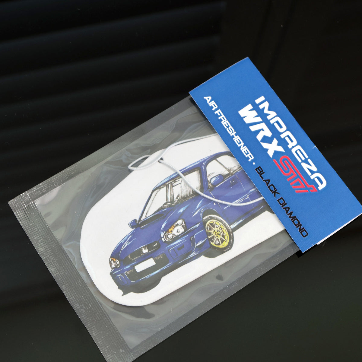 Individually seal packaged Subaru WRX Sti air freshener in black diamond scent