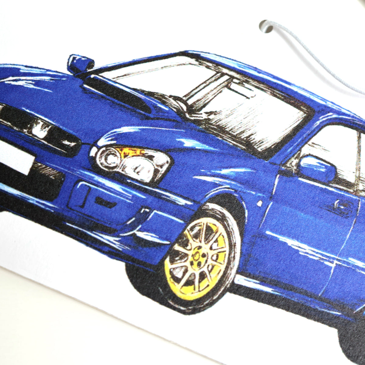 Closeup of Subaru WRX Sti air freshener