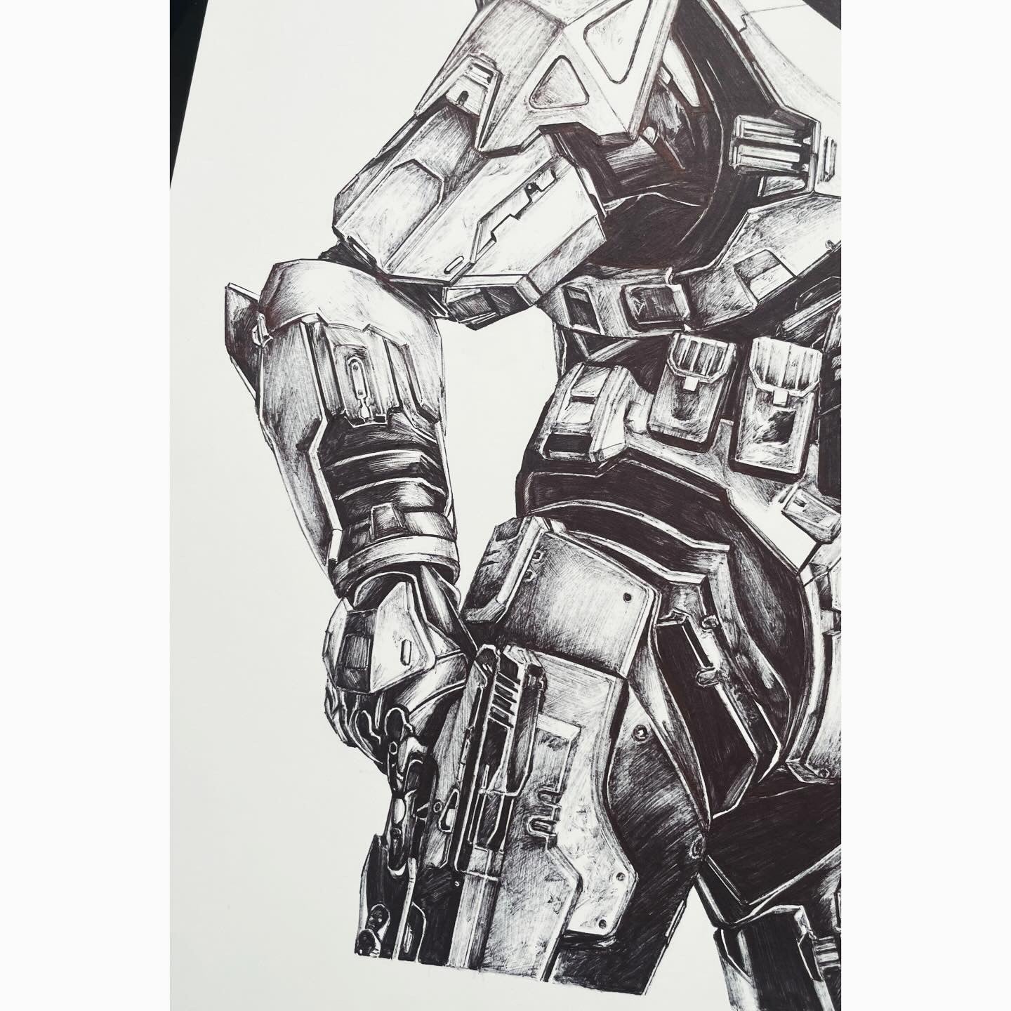 Closeup of the arm of Master Chief Petty Officer John-117 ball pen drawing, in his legendary Mark V armor, inspired by the Halo franchise.