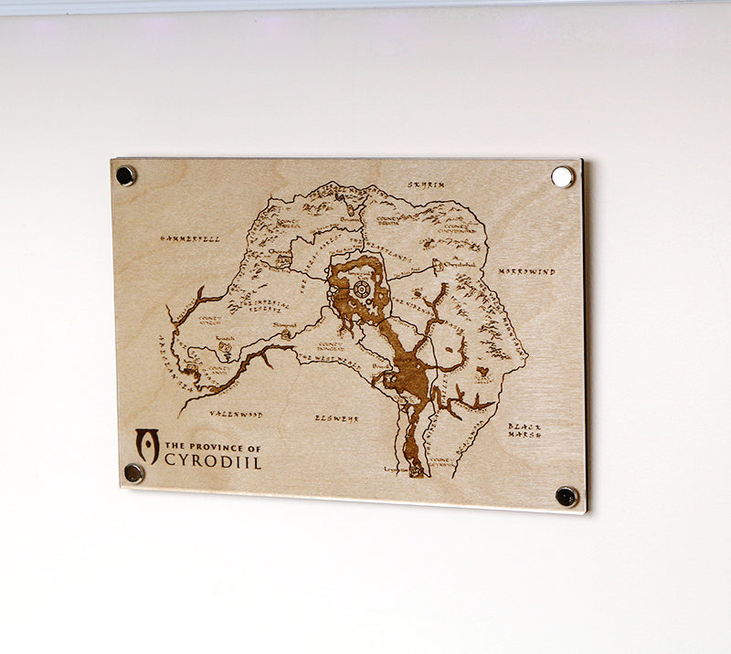 Laser‑engraved map of the Province of Cyrodiil on LayaBoard displayed on wall. Featuring detailed etched regions and landmarks inspired by The Elder Scrolls IV: Oblivion.