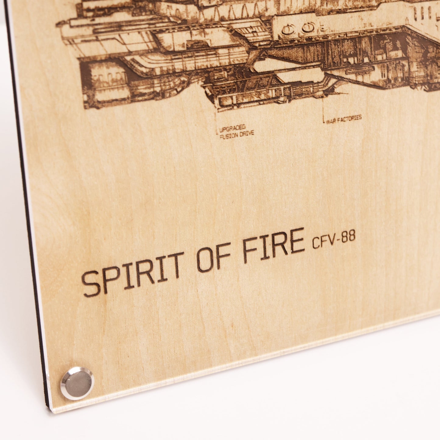 Lower corner closeup of blueprint-style diagram of Halo Iconic UNSC Spirit of Fire, laser-etched on birch veneered timber and encased in a sleek LayaBoard frame.