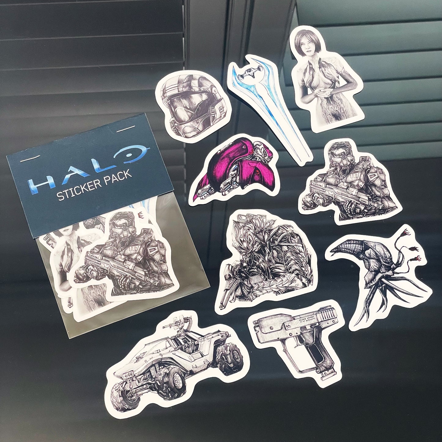 Halo’s classic icons stickers packs. High-quality vinyl stickers with vivid colors and sharp image clarity. Showing details of 9 original designs inspired by the legendary franchise. Each sticker is hand-drawn and designed by Entransing.