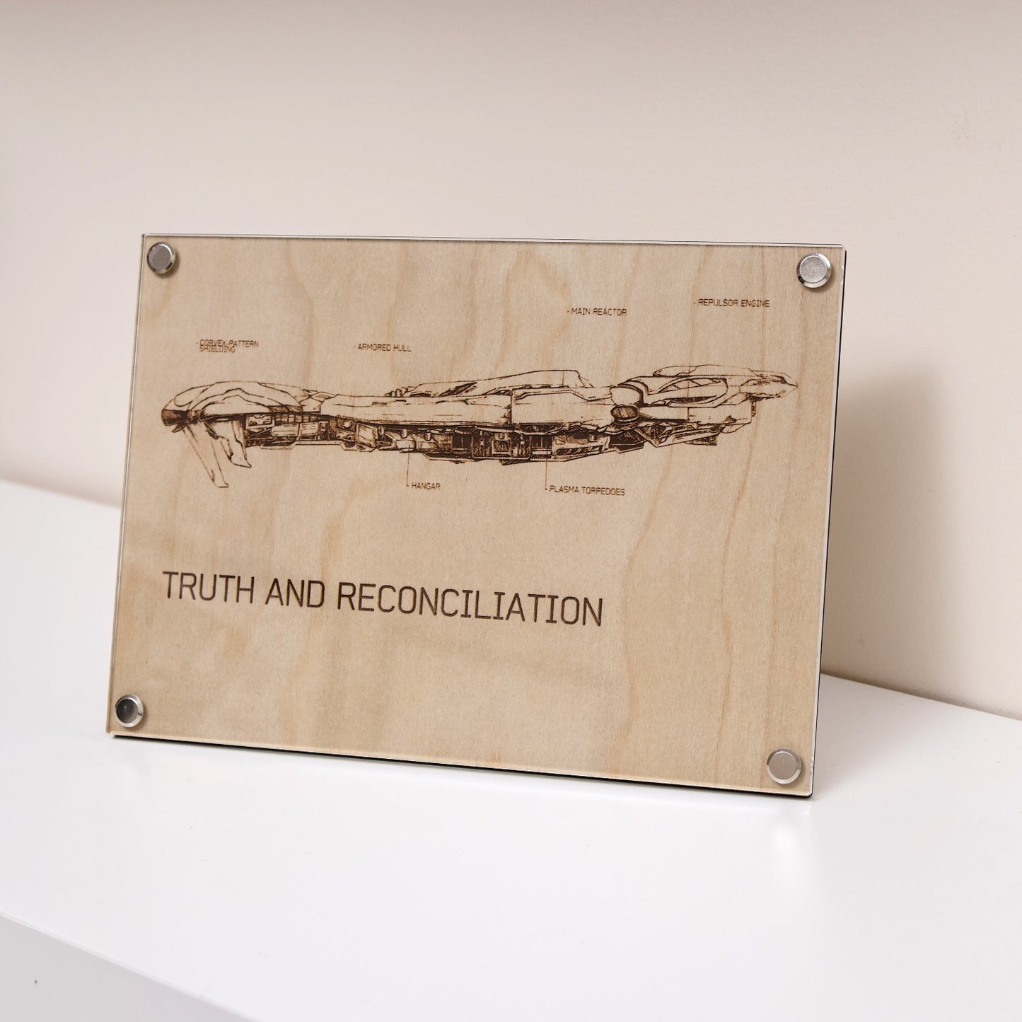 Truth and Reconciliation Ship Diagram LayaBoard Art, unique wall art and decor inspired by Halo, with its representation of the legendary Covenant ship, the Truth and Reconciliation displayed on table.