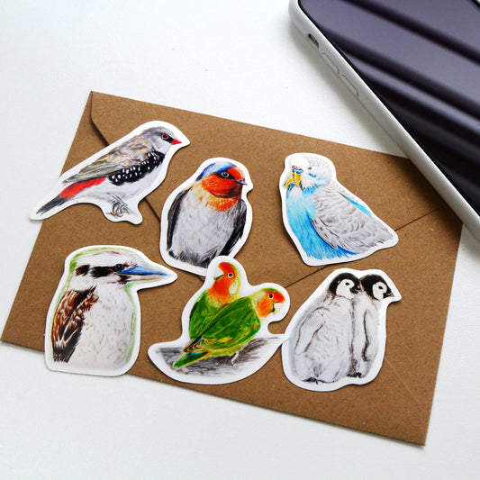 This Australian bird art vinyl stickers pack includes 6 stickers: 1 x Kookaburra, 1 x Diamond Firetail, 1 x Budgerigar, 1 x Babies Empero, 1 x Love Birds, 1 x Welcome Swallow. Made from high quality vinyl, these stickers are beautifully vivid in colour and capture each iconic Australian bird in stunning detail. 