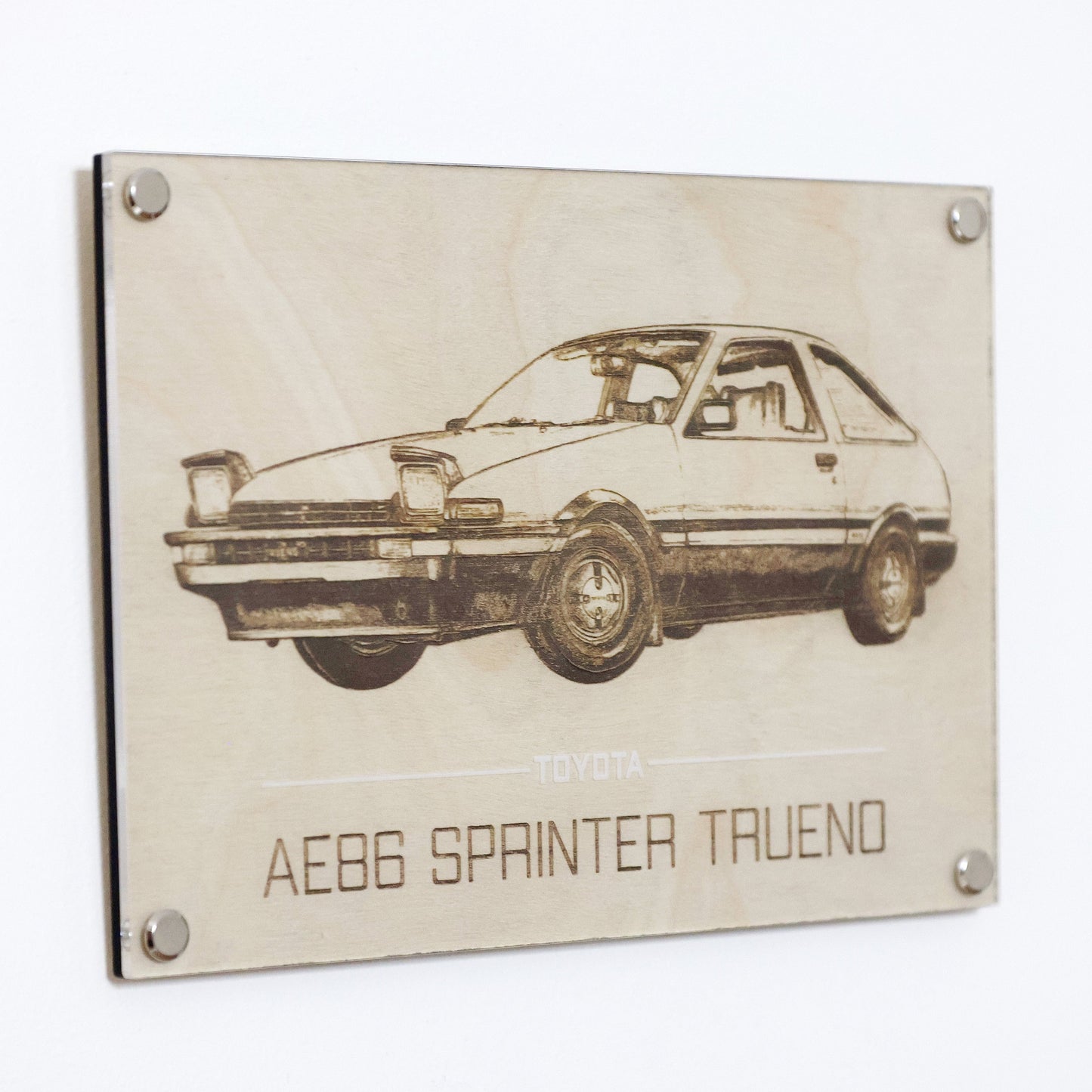 AE86 car art. Laser engraving example of Legendary Toyota AE86 Spinter Trueno. Wall hanged with Artysn Studio's LayaBoard frame.