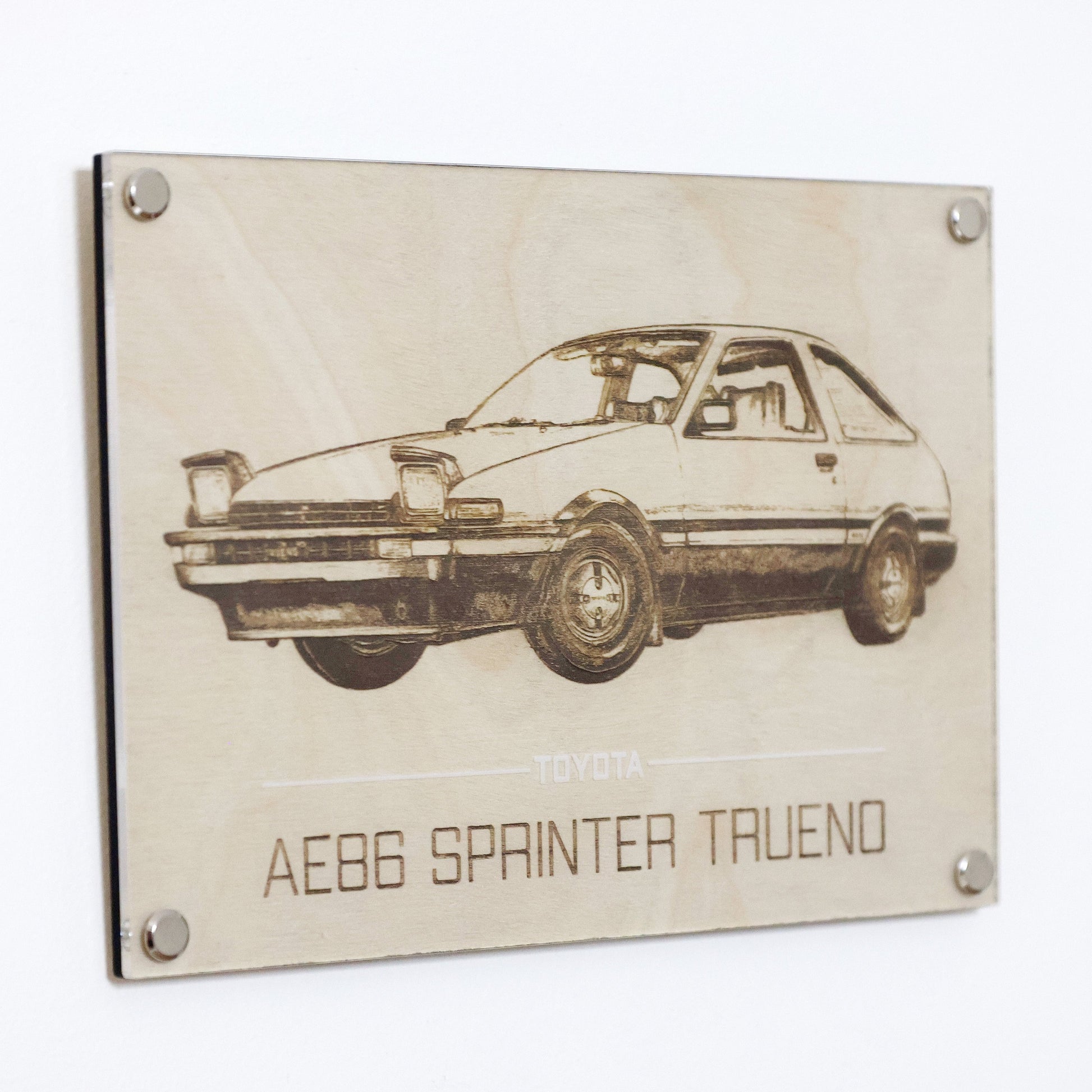 AE86 car art. Laser engraving example of Legendary Toyota AE86 Spinter Trueno. Wall hanged with Artysn Studio's LayaBoard frame.