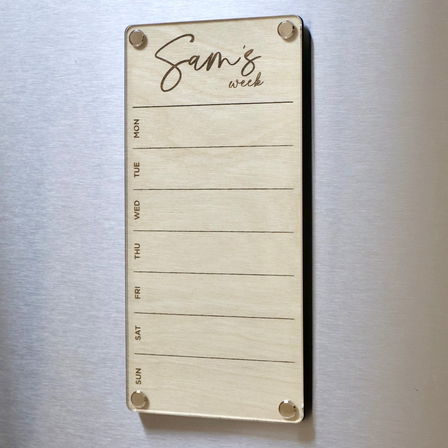 Weekly planner mini LayaBoard from Artysn Studio.  This magnetic board feature a wood base where the design and text is etched onto. Placed on top is a layer of crystal-clear acrylic that provides a glass-like finish and brilliantly smooth surface for writing on. The metal screws and lugs give the board a premium look and finish.