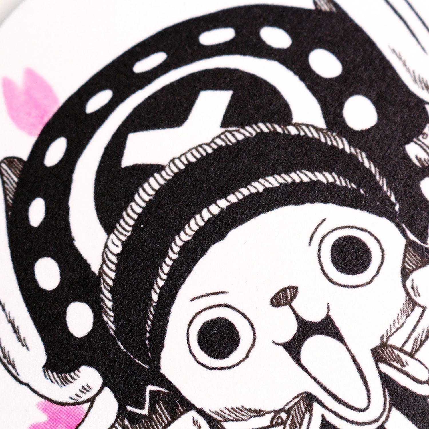 Close‑up of Chopper air freshener showing detailed of artwork upper part.