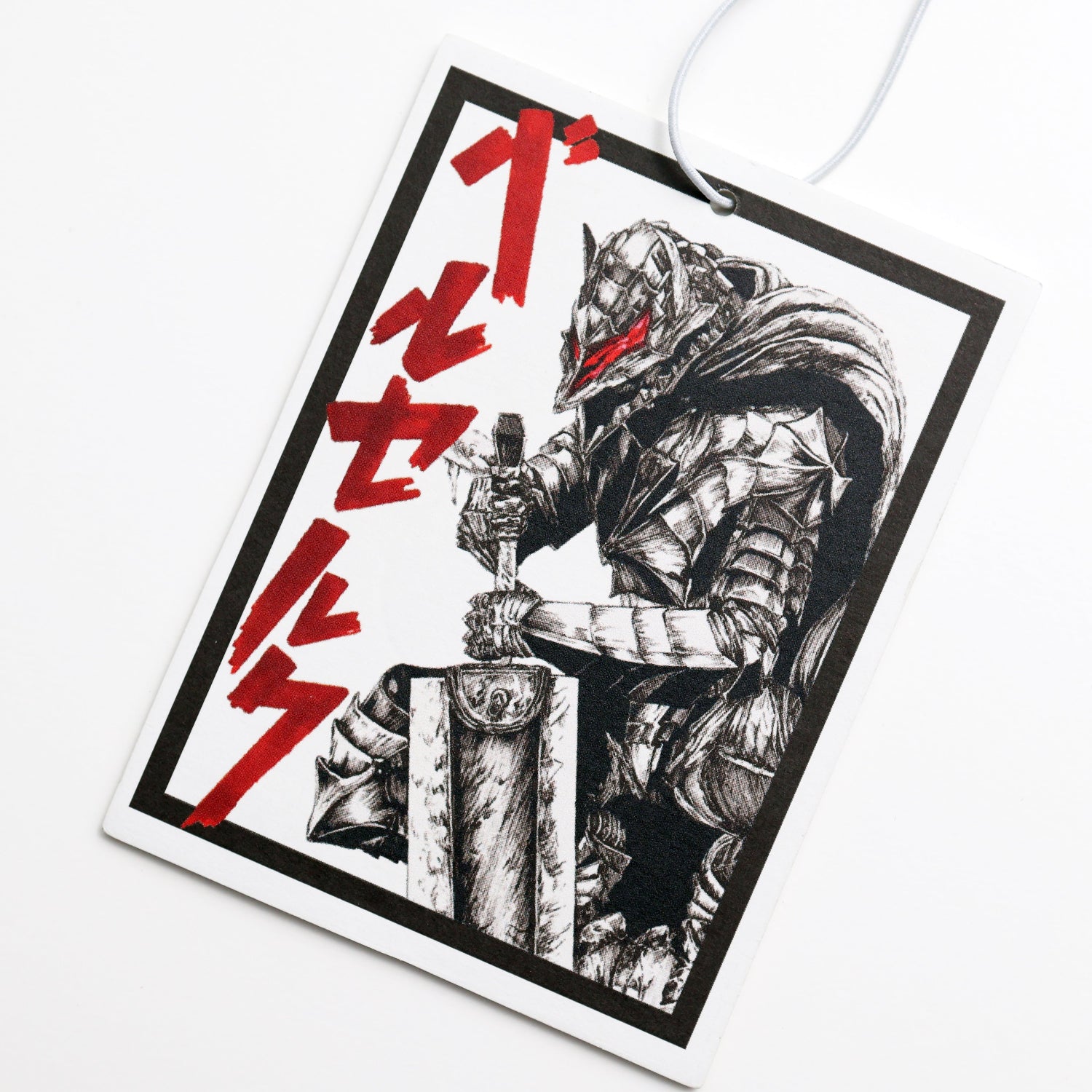 Closeup of Car Air Freshener featuring Berserker Armor design, inspired by the Berserk manga series.