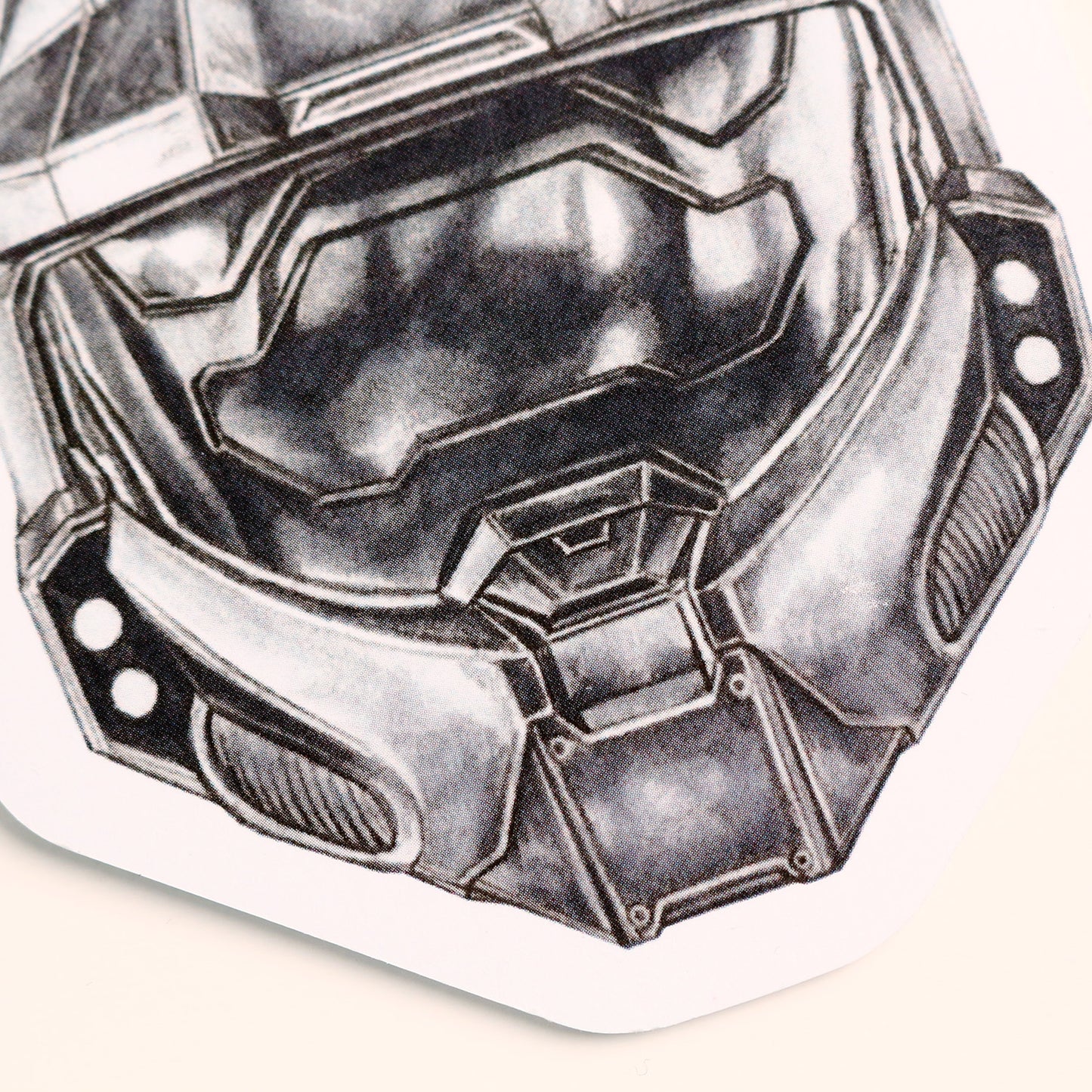 Zoomed view of printed Master Chief illustration on car air freshener surface.