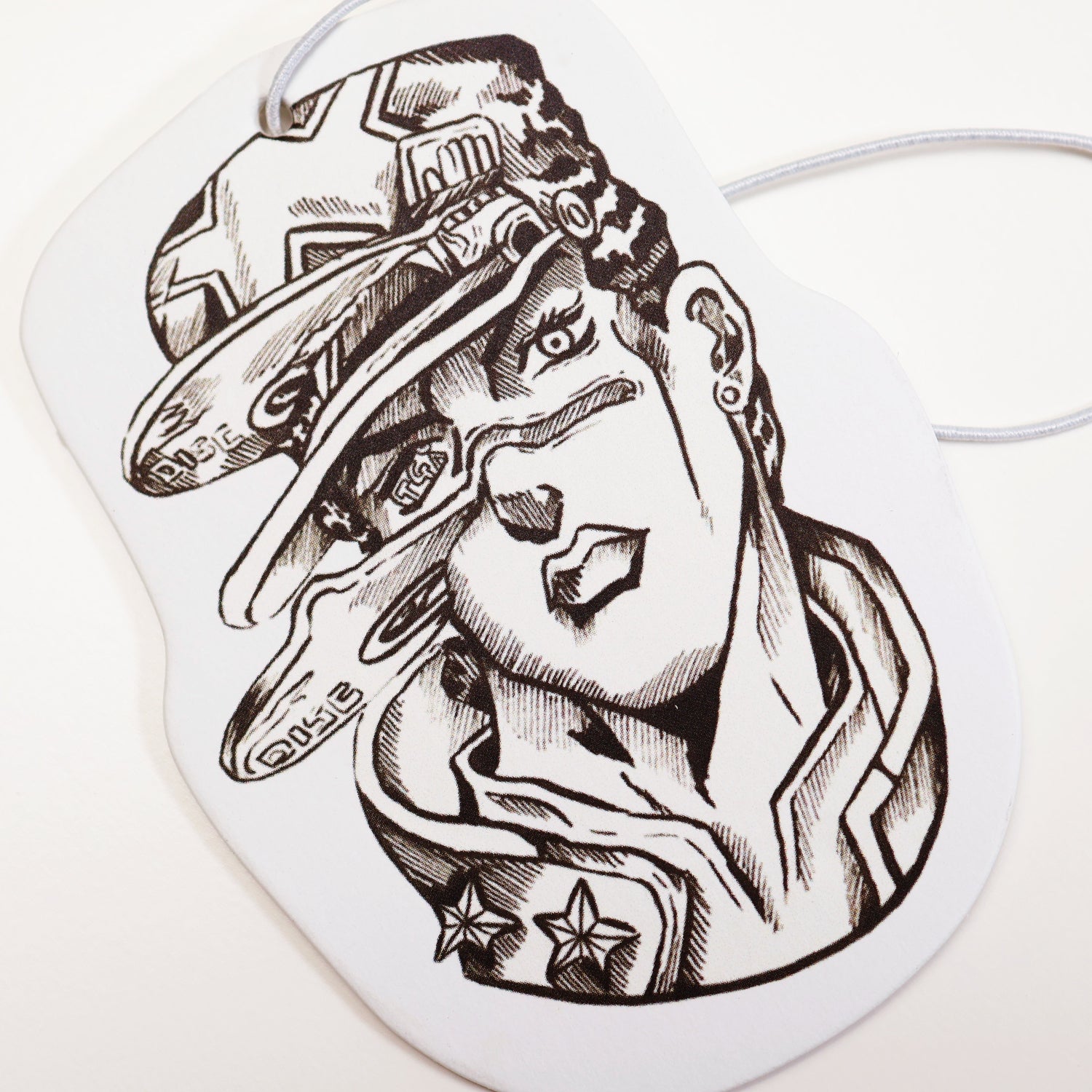 Close up of the Car Air Freshener - Jotaro Kujo's Discs, inspired by Jojo's Bizarre Adventure. This unique air freshener features the iconic fateful moment of Jotaro Kujo. Measures: H: 10cm x W: 7cm. 