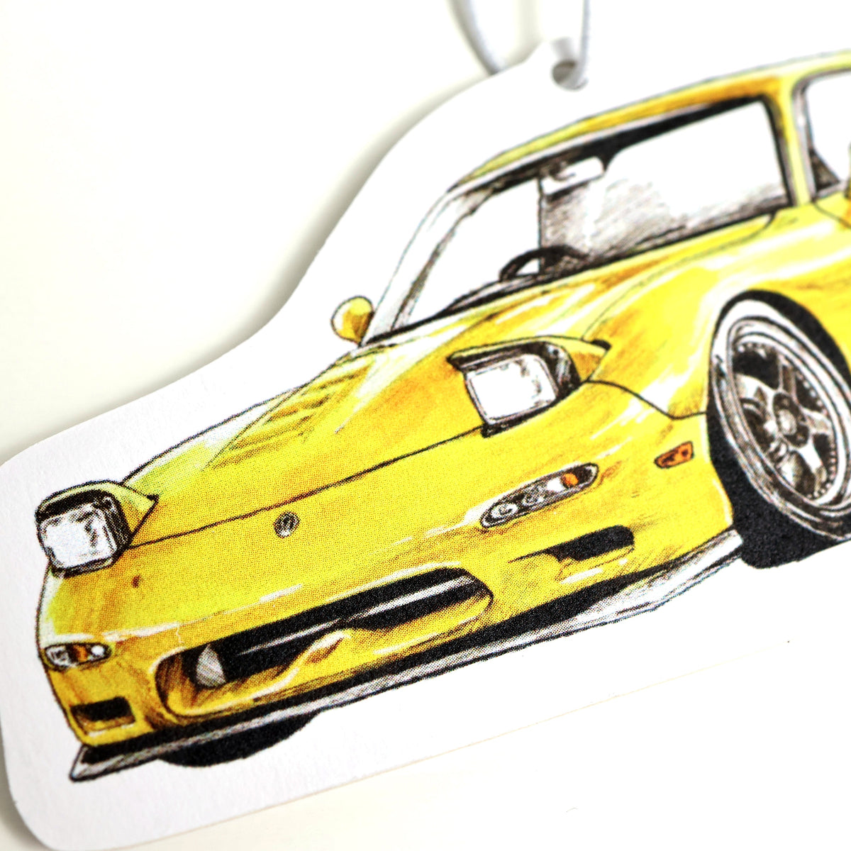 Closeup of Mazda RX-7 FD car air freshener