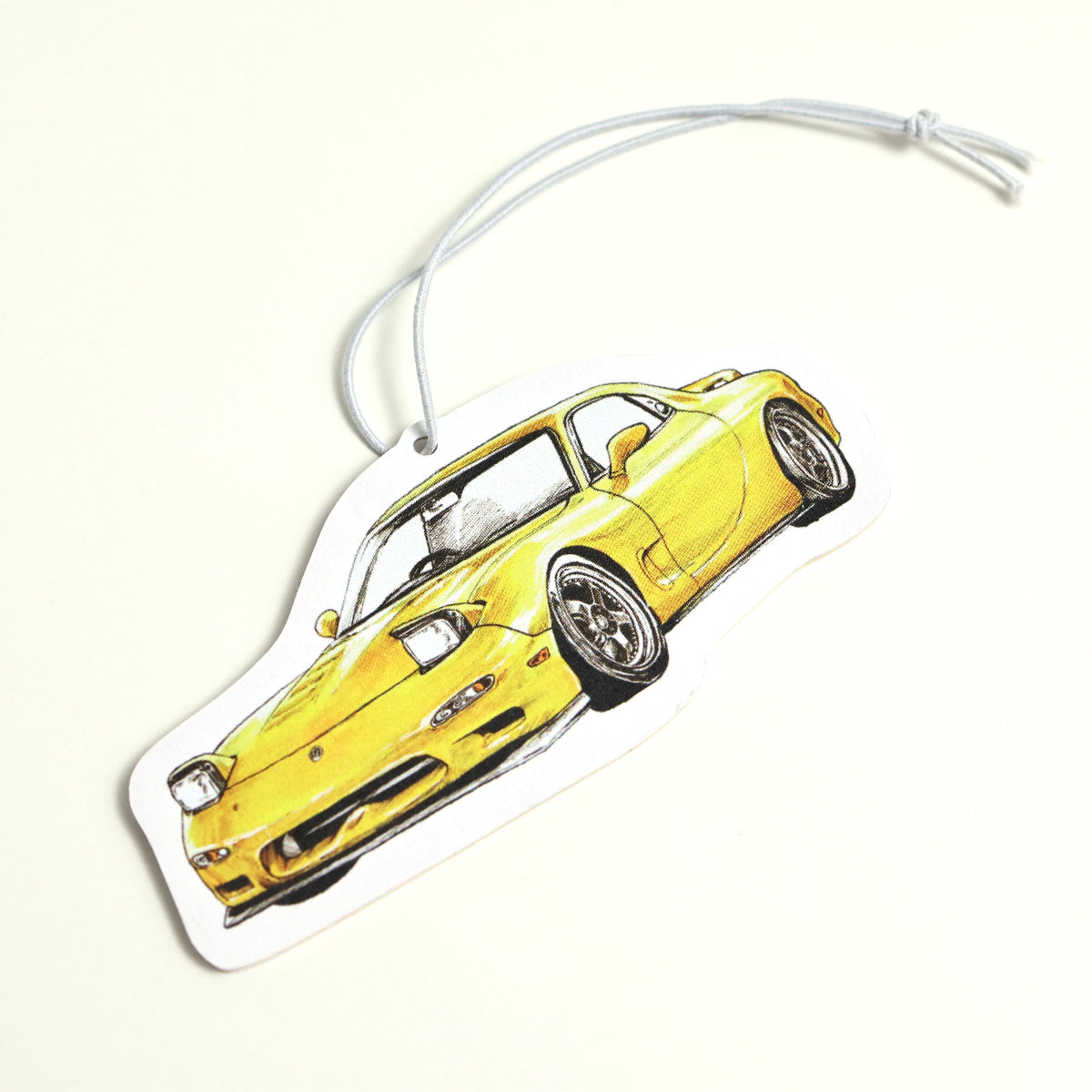 JDM-style RX-7 air freshener card with matte finish with elastic tie, ready for display