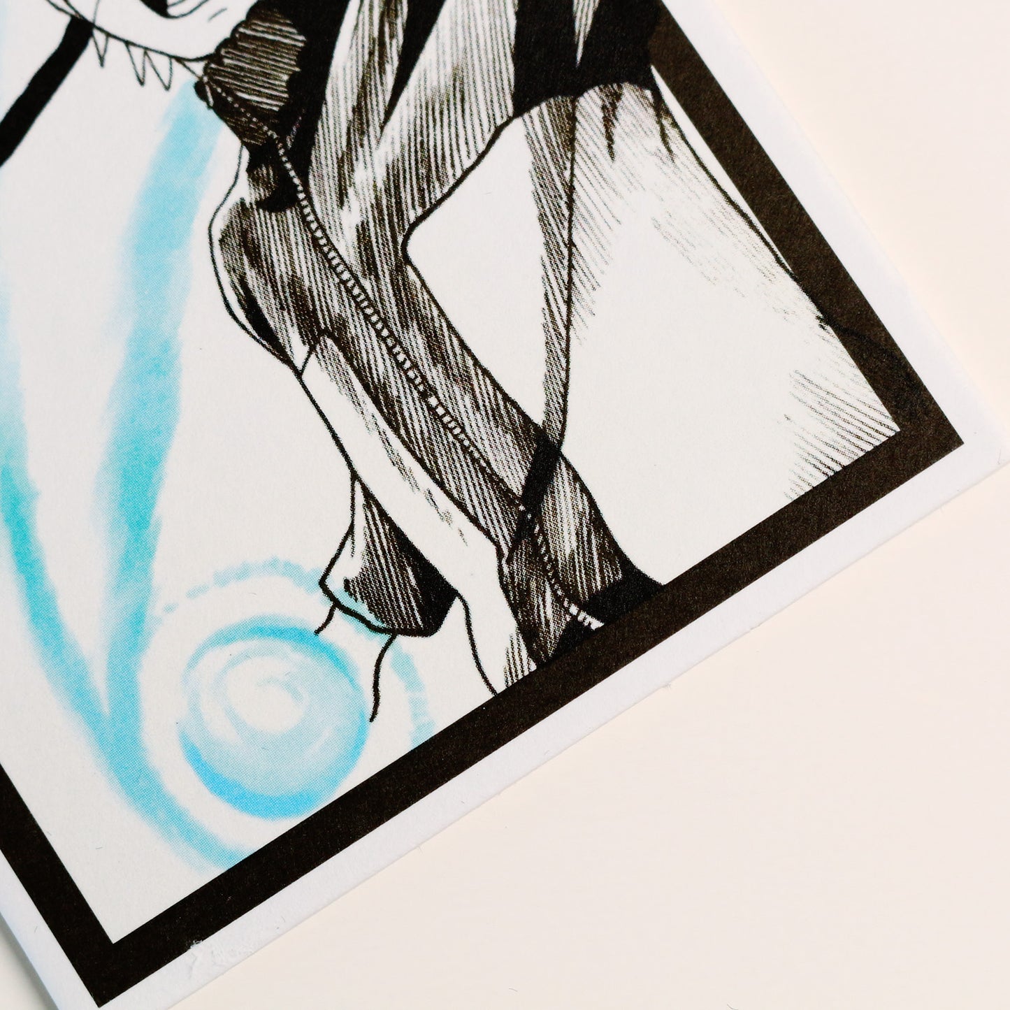 A close-up of Naruto manga artwork with a light blue circular energy swirl on hand.