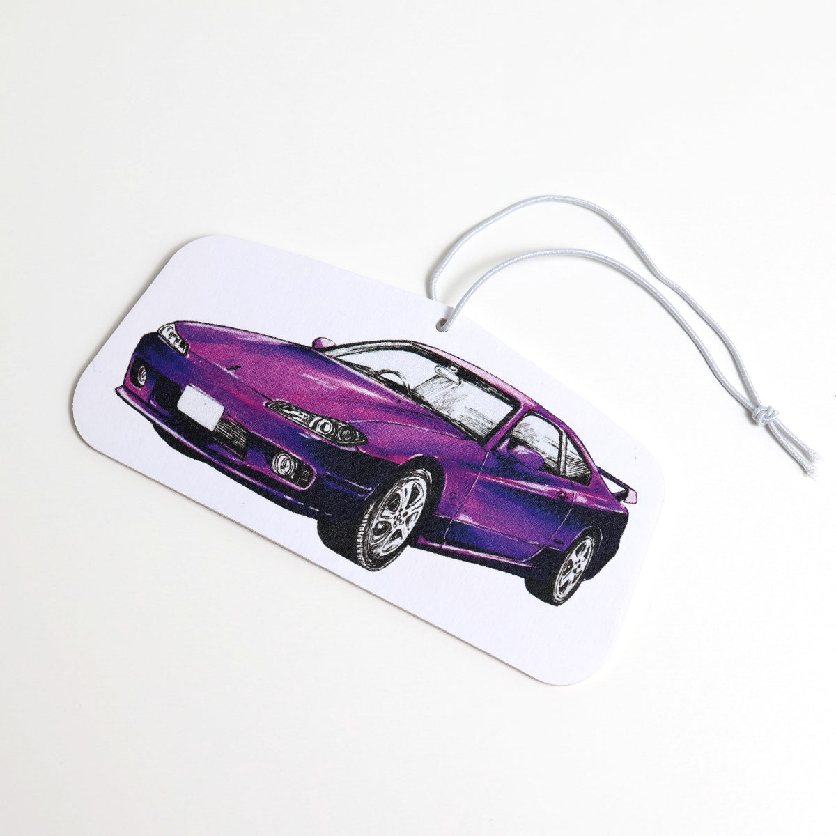 Drift-inspired Nissan Silvia S15 air freshener with elastic tie, ready for display