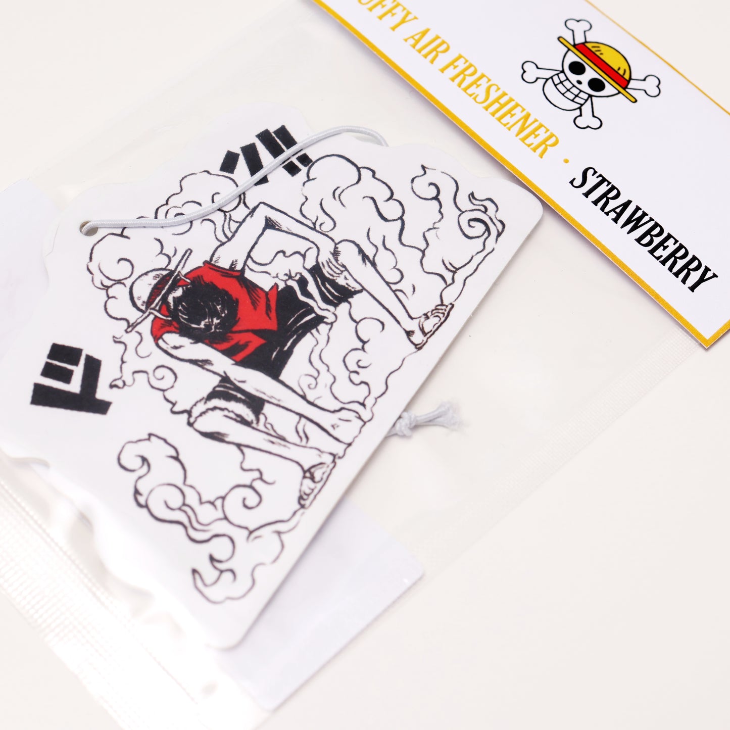 This One Piece Luffy air freshener card
Strawberry scent provides a sweet and fruity aroma to uplift your spirits. Each air freshener comes sealed and includes an elastic tie for easy placement.