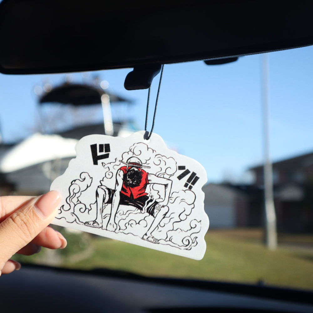 This One Piece Luffy air freshener card design, featuring Entransing's hand drawn artwork, is ideal for adding a touch of style to your car while keeping the air fresh.