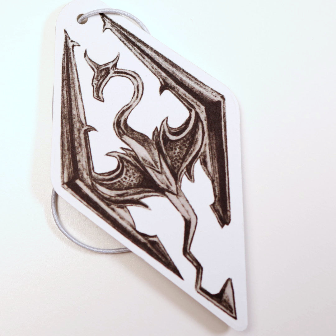 Close up of the Seal of Akatosh car air freshener card design inspired by Skyrim. Measures: H: 10cm x W: 5.5cm. 