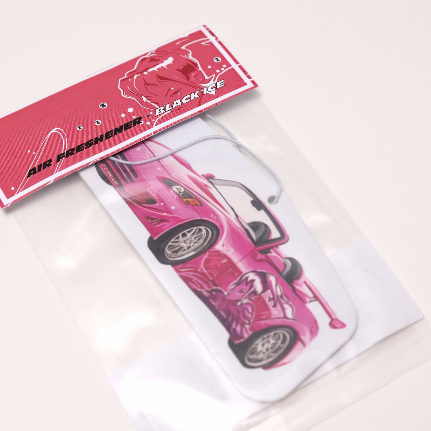 Suki S2000 car air freshener inspired by Fast and Furious Black Ice, offers a cool, crisp fragrance. Each air freshener comes sealed and includes an elastic tie for easy placement.