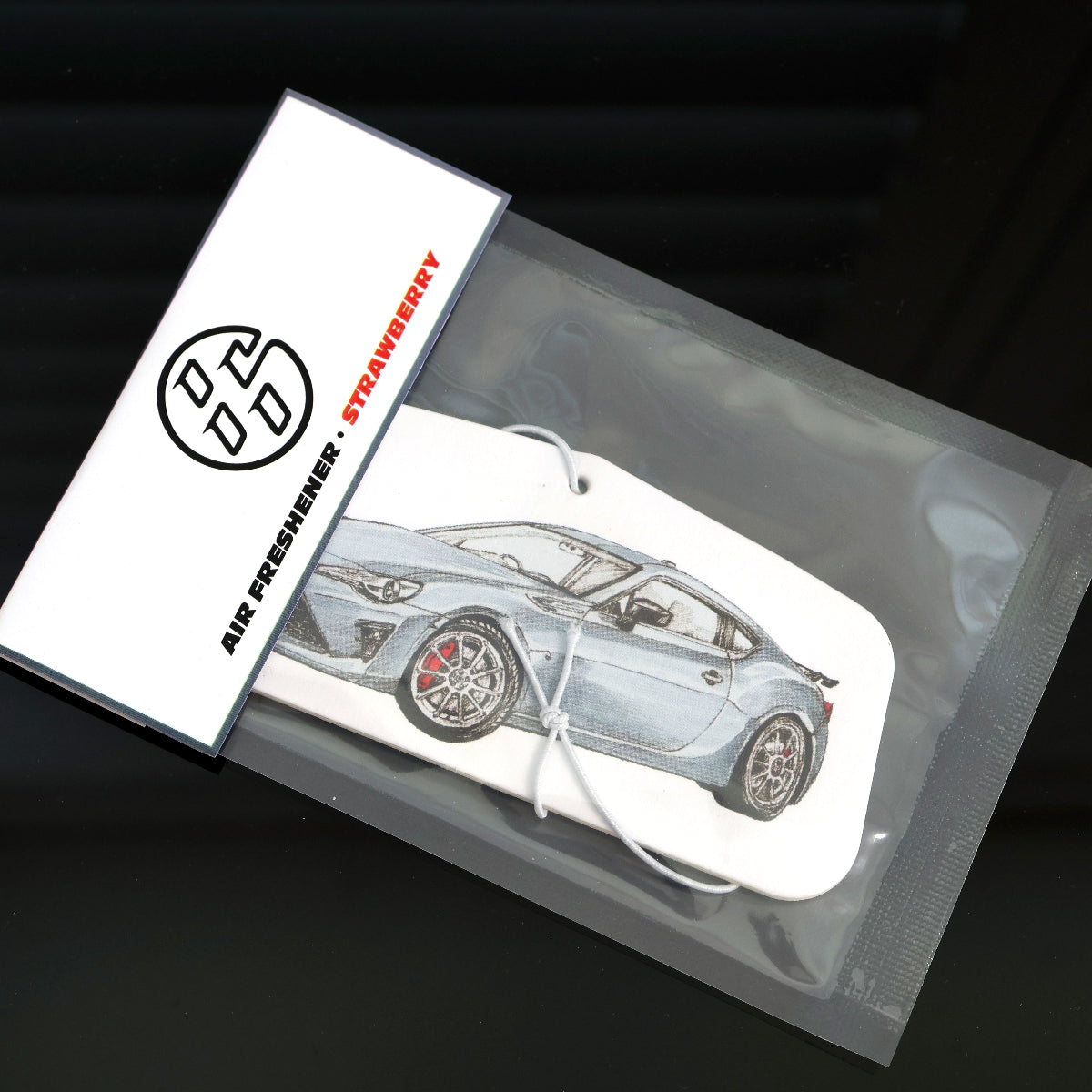 Strawberry-scented Toyota 86 air freshener sealed in packaging