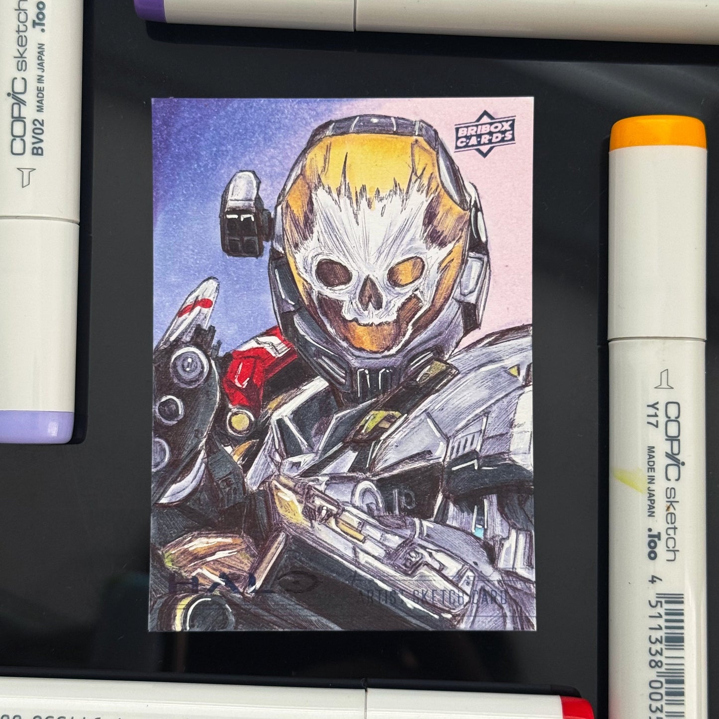 Original Emile‑A239 trading card featuring skull‑etched EVA helmet artwork by Entransing.