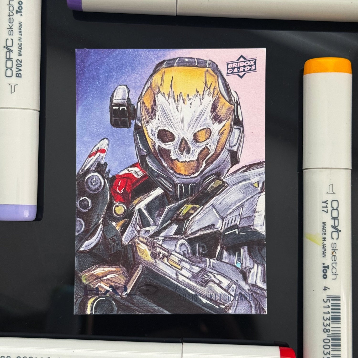 Original Emile‑A239 trading card featuring skull‑etched EVA helmet artwork by Entransing.