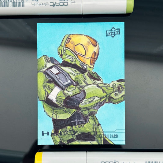 Original EVA‑class Spartan helmet artwork by Entransing, single Halo trading card.