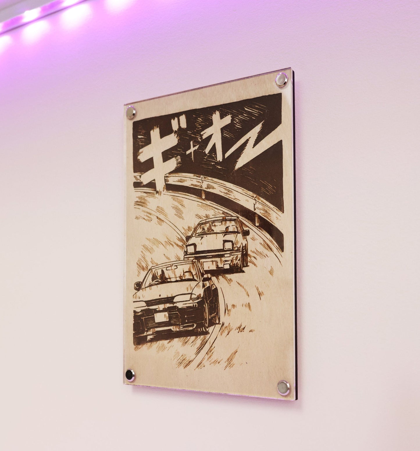 JDM car culture artwork created with LayaBoard Art system. This picture showing a laser engraved artwork of Nissan GTR R32 racing Toyota AE86 in manga style hanged on wall.
