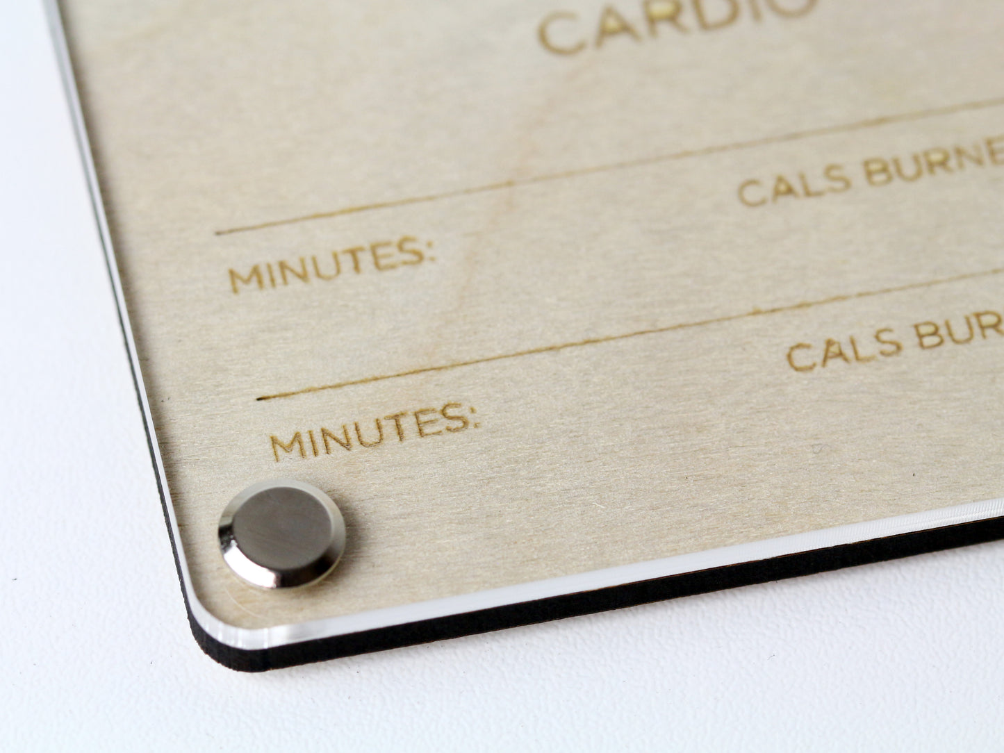 Bottom corner close-up of custom Recipe Display LayaBoard with engraved wooden base and clear acrylic cover.