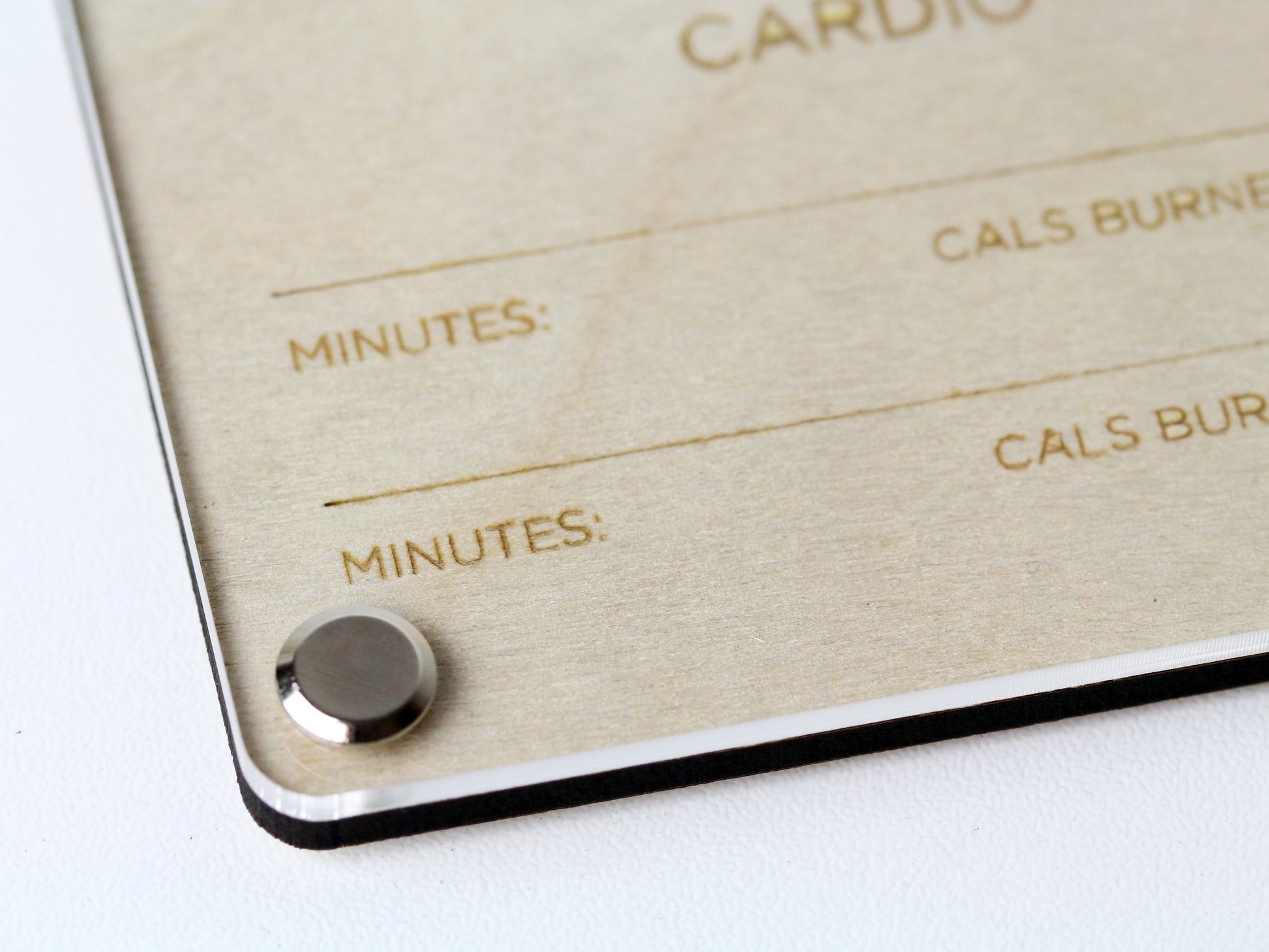 Bottom corner close-up of custom Recipe Display LayaBoard with engraved wooden base and clear acrylic cover.