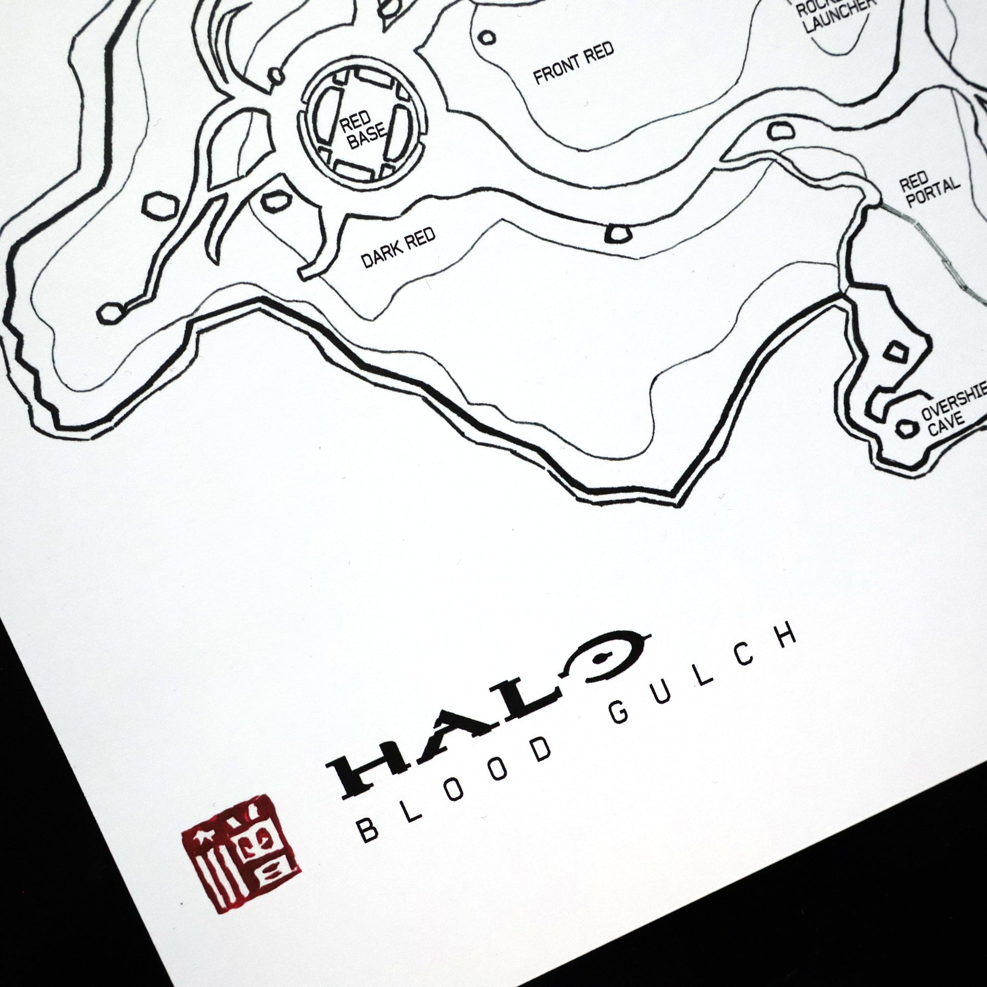 Closeup of hand‑drawn Halo Blood Gulch blueprint map print with Entransing's signature stamp.