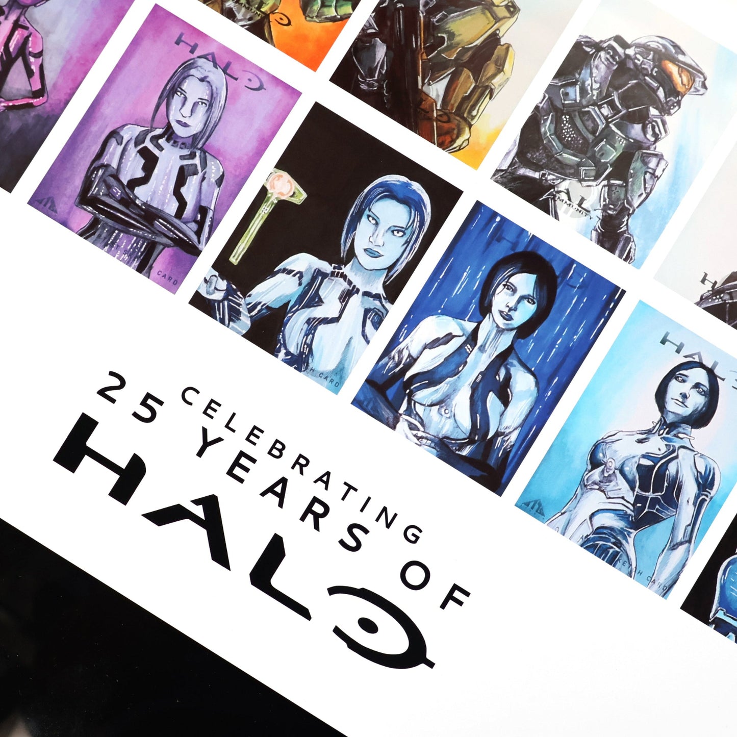 Closeup of collection of 'Halo' themed cards celebrating 25 years of the franchise.