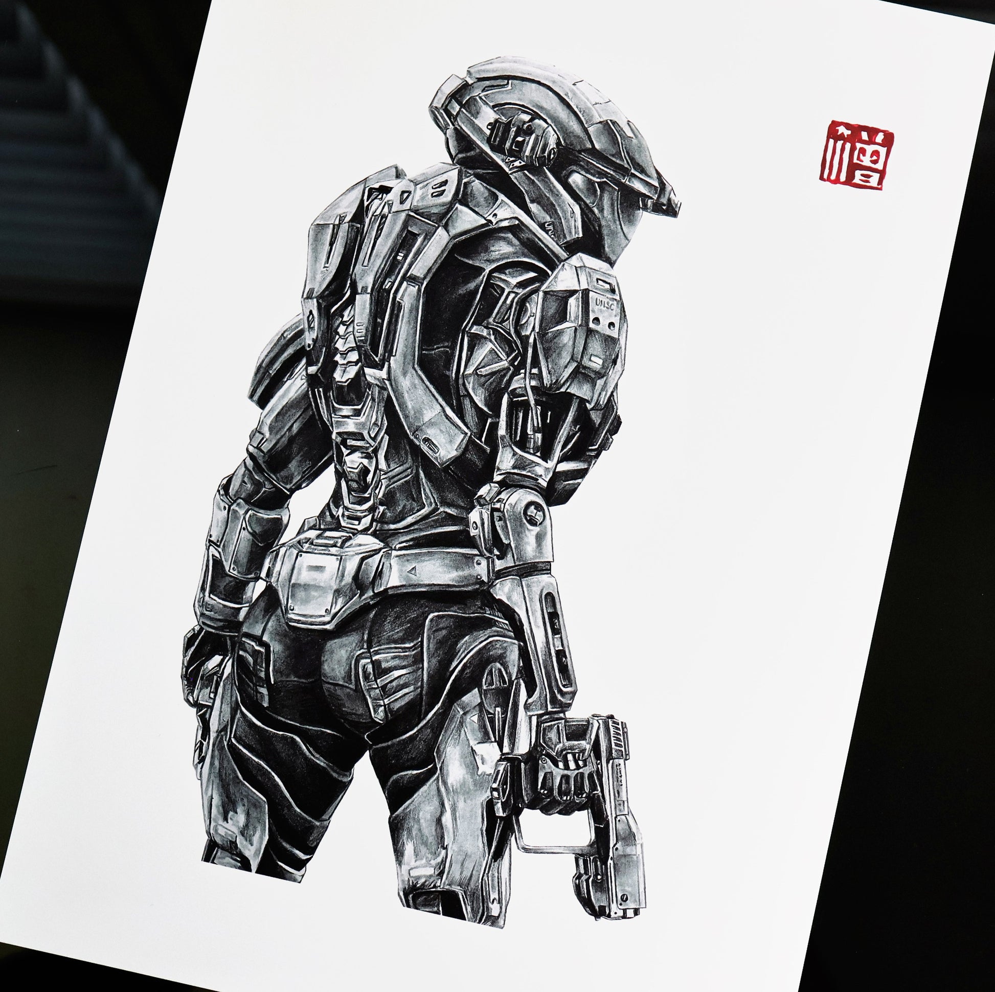Hand‑drawn Halo Reach art print of Kat‑B320 in a reflective, tactical pose, highlighting her distinctive Spartan armour. A4 matte fan art poster for Halo collectors.