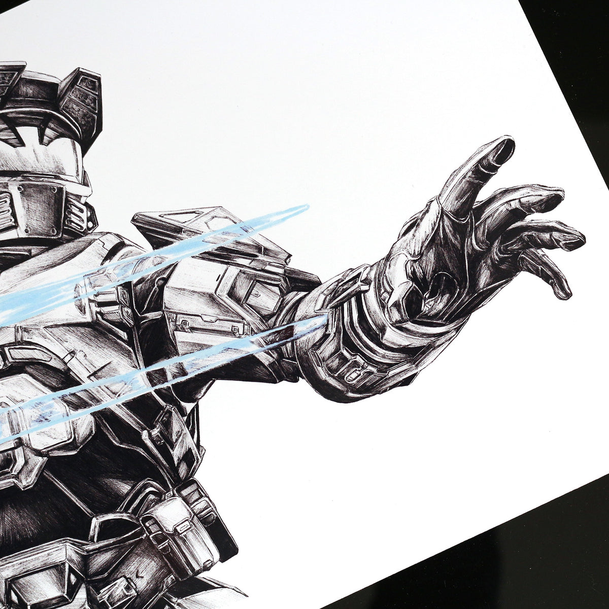Close‑up of Master Chief’s left arm and Energy Sword tip showing detailed Spartan armor linework.