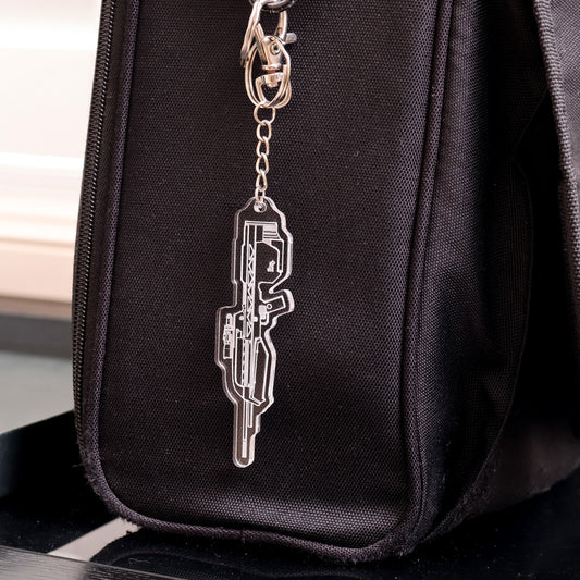 Halo Battle Rifle acrylic keyring attached to backpack zipper