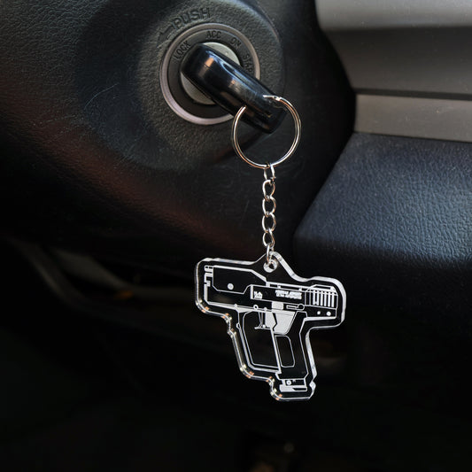 Halo Magnum Pistol acrylic keyring attached to car keys, styled for everyday use.