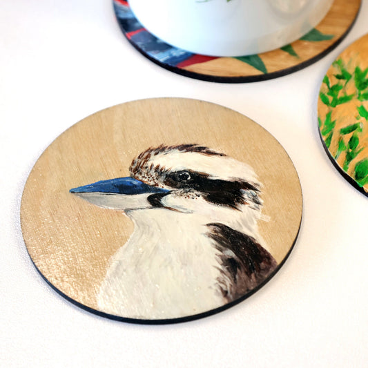 Original Australian art. Hand painted kookaburra on wooden coaster. Left side view of head and upper body. Original Australian bird artwork from Artysn Studio.