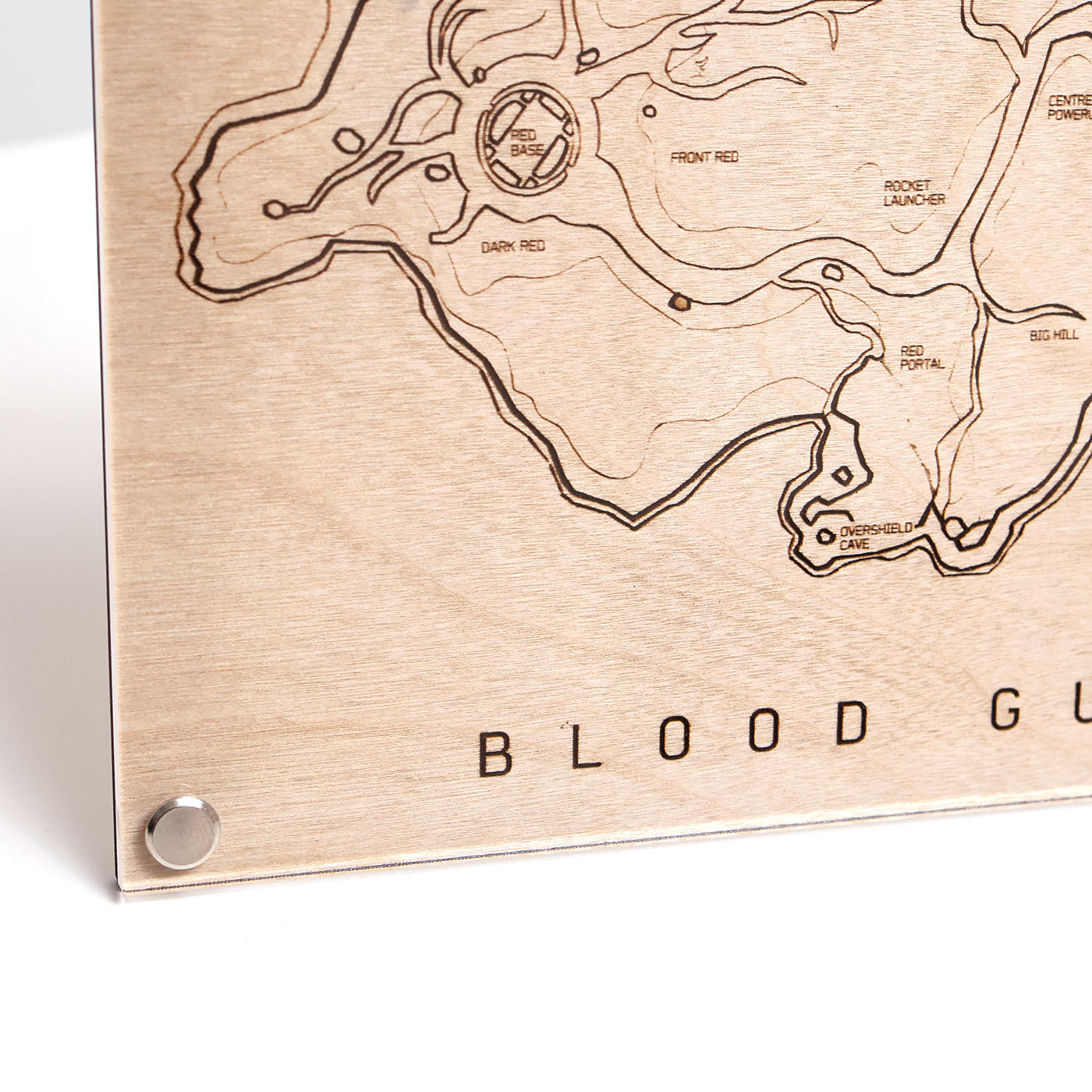 Laser‑engraved A5 Blood Gulch map diagram with callouts in LayaBoard frame lower left corner closeup.