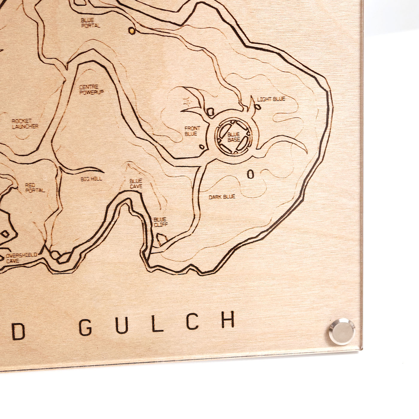 Laser‑engraved A5 Blood Gulch map diagram with callouts in LayaBoard frame lower right corner close-up.