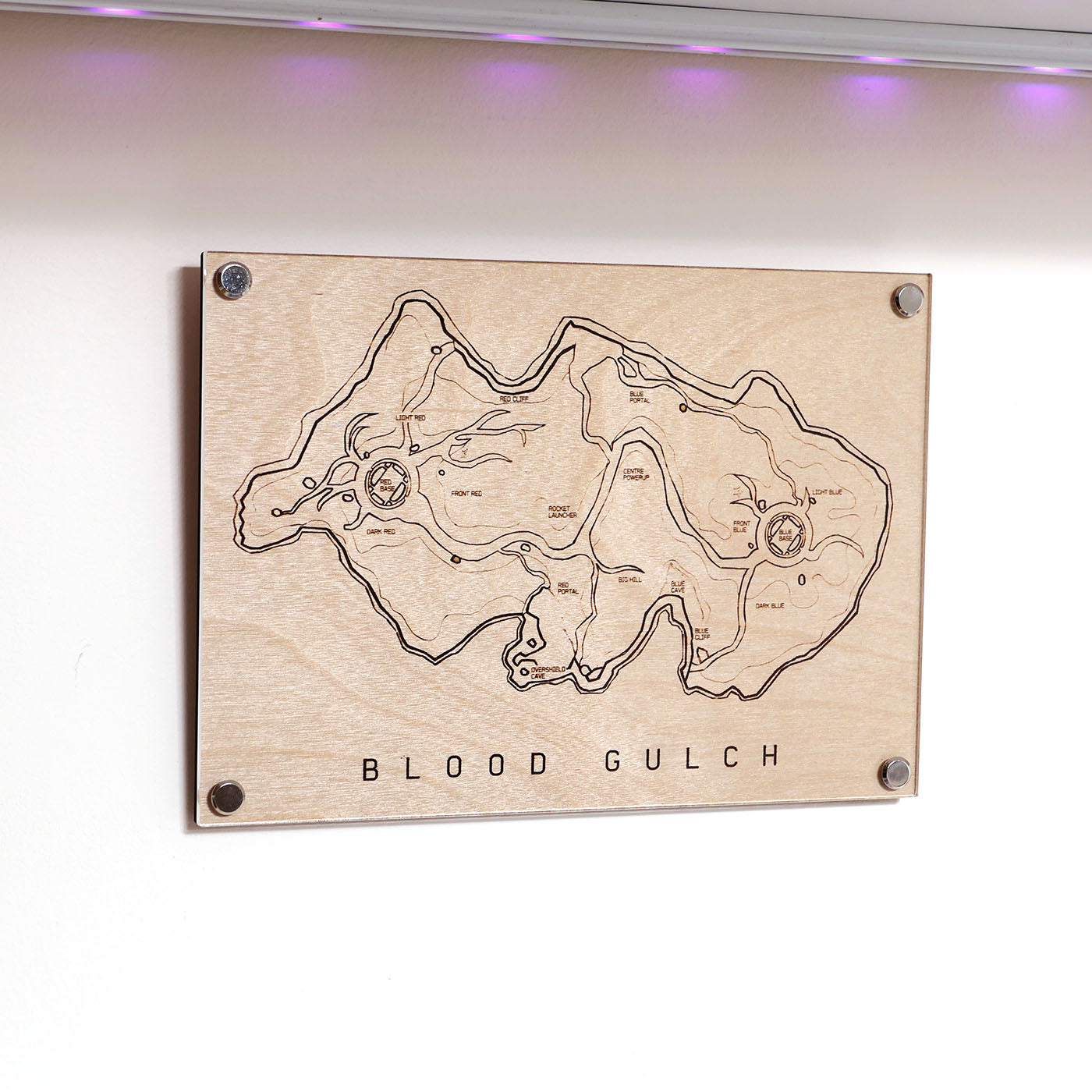 Laser‑engraved A5 Blood Gulch map diagram with callouts in LayaBoard frame displayed on wall.